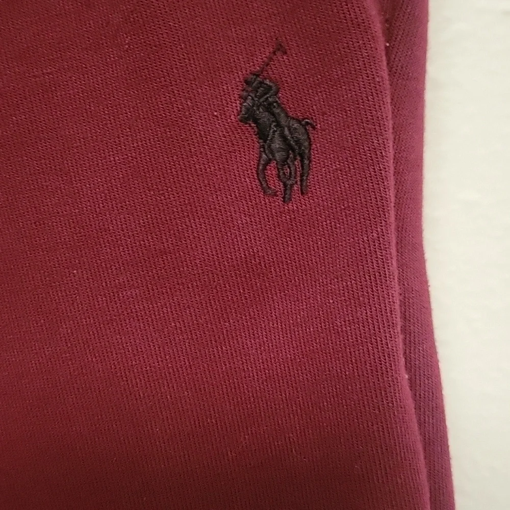 Polo Ralph Lauren Burgundy Jogger Pants With Back Zipper Pocket.